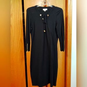 Black form-fitting Calvin Klein dress